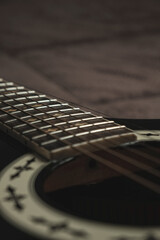 Strumming harmony from wooden strings on a quiet evening