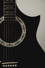 Heartfelt tunes echo from a lovely black guitar on a quiet evening