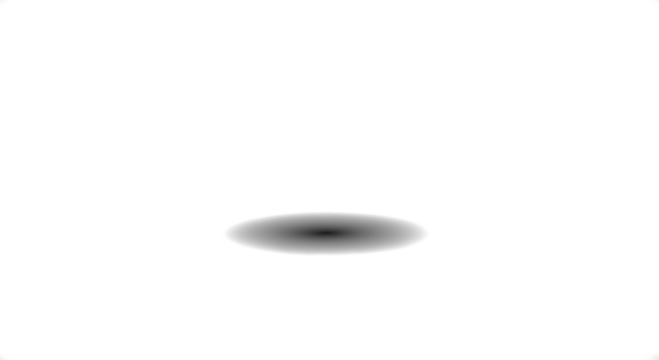 A blurry black spot on a white background, creating a simple and minimalist image.