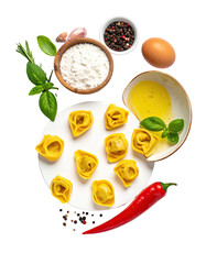 Fresh tortellini pasta ingredients arranged on a white plate