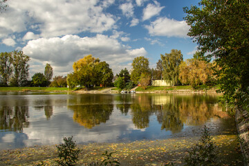 Fototapeta premium Autumn landscape with a dam