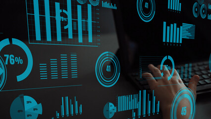 Interactive data visualization with graphs and statistical charts displayed on a digital screen. User engages with analytics for informed decision-making and insights. Xenic