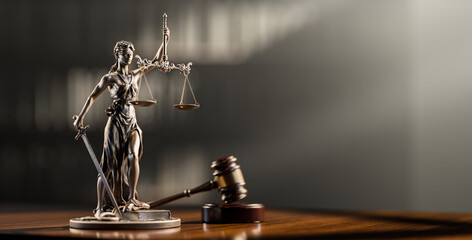 Legal Concept: Themis is the goddess of justice and the judge's gavel hammer as a symbol of law and order on the background of books