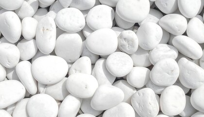 Close-up of a collection of smooth, white river stones for background