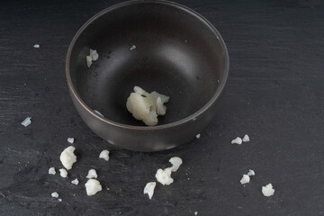Steamed cauliflower pieces close up