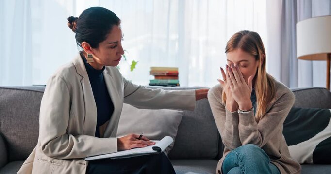 Clipboard, therapy and women on sofa, empathy and consultation for recovery support and mental health. Counselor, psychologist and notes in conversation for trauma, office or explain depression