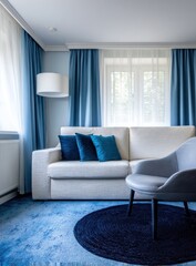 Fototapeta premium A bright living space with blue curtains and rug, light-colored sofa and a round rug