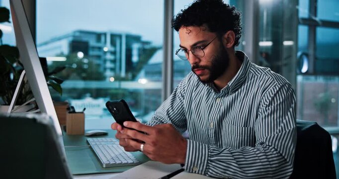 Business, man and typing with phone in office for accounting, check notification and evening. Person, computer or mobile for schedule update, search internet or chat online for late proposal feedback