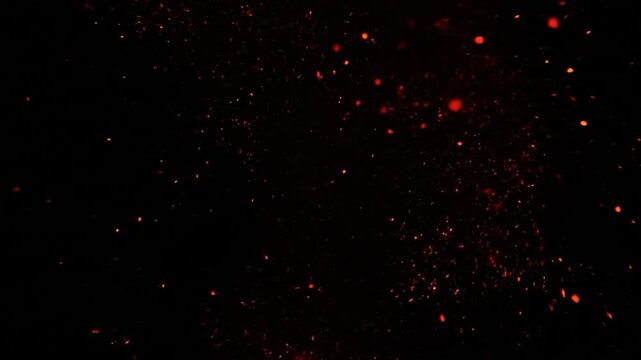A mysterious red question mark symbol explodes into a cloud of fiery embers.