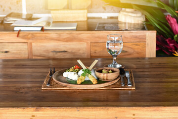 Nasi campur Bali, Indonesian Balinese rice with sat lilit, ayam sisit, sambal matah, fried peanuts, and lawar with Balinese spices. Balinese mixed rice is one of Bali's most popular culinary specialti