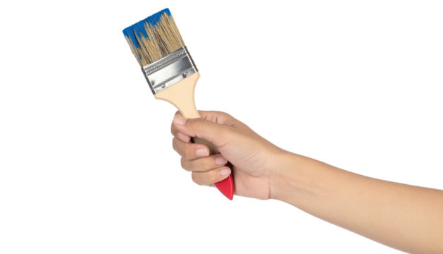 A hand holding a paintbrush. The brush is angled slightly, with a light beige wooden handle, a metal ferrule, and a blue bristle tip. The hand grasps the handle firmly