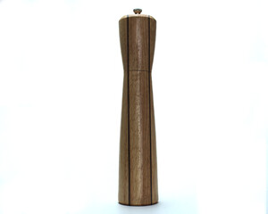 A handcrafted wooden pepper mill is centrally placed on a white background. The mill is placed vertically.  There is ample space for text.  The piece is representative of artisan quality woodworking. 