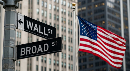 Obraz na płótnie Canvas Wall street and broad street signs with american flag in new york city backdrop view