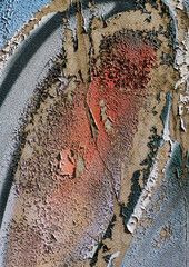 old graffiti wall with faded paint, deep scratches, and visible signs of wear and tear. The surface shows layers of spray paint, peeling texture, and rough markings, creating a gritty urban background