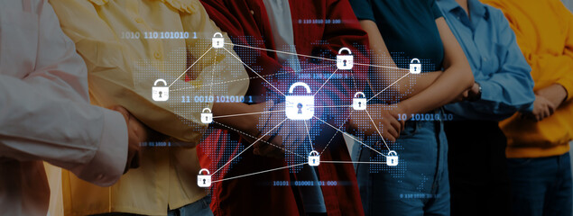 A diverse group of young adults stands together, surrounded by digital padlock icons, highlighting the importance of cybersecurity and data protection in today technology-driven world. Trope