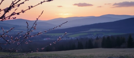 Sunrise and sunset over misty mountain landscape