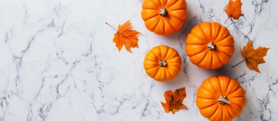 Autumn Pumpkins with Red and Orange Fall Leaves