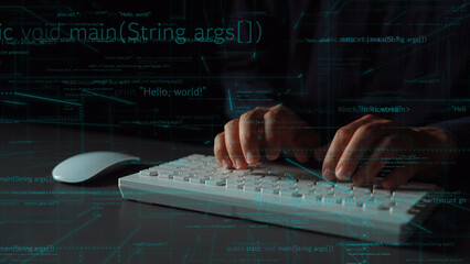 A pair of hands typing on a modern keyboard surrounded by flowing lines of coding text. This image symbolizes technology, programming, and digital innovation. Xenic