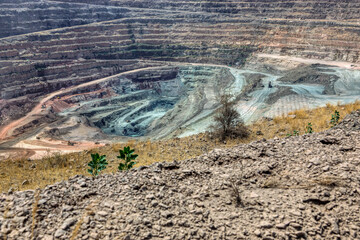 open pit mine at a diamond mine in Africa, quarry exploitation, excavations and earth moving...