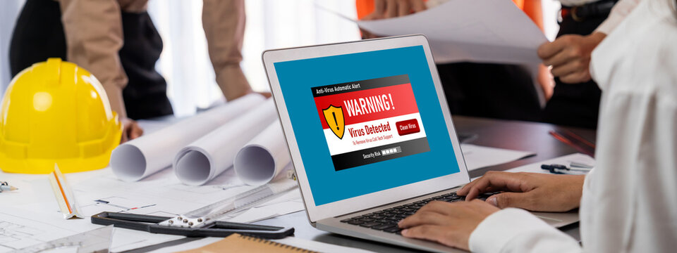 Virus warning alert on computer screen detected brisk cyber threat , hacker, computer virus and malware - Powered by Adobe