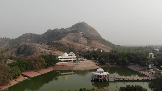 Mandar Hill, near Banka in Bihar, is a sacred site linked to the Samudra Manthan legend. The hill has ancient Jain and Hindu temples, stone carvings, and a calm lake, attracting pilgrims and tourists 