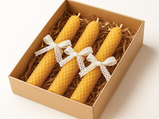 Elegant gift box of honeycomb pattern beeswax candles with lace bow accents
