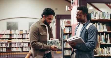 University, students and handshake with books in library for study material, assignment chat or info. Friends, people or course textbooks at college for exam preparation, PHD discussion and education - Powered by Adobe