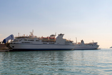 Two Ro-Ro passenger ferries at a coastal port © Sergey