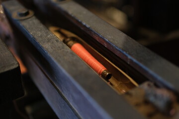 Cinematic video of silkworms hatching, feeding on mulberry leaves, spinning cocoons, and silk...