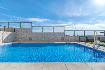 Premium aquatic area with main pool and separate jacuzzi with panoramic views