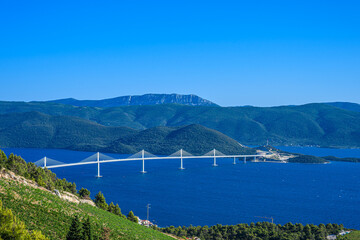 Peljesac Bridge in southern Croatia captured from multiple angles showcasing elegant design blue...