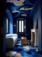 Intimate room with curved ceiling, cloud motif, sofa, fireplace, and dark blue walls