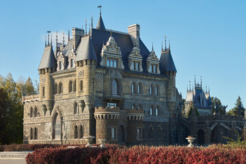 Obraz premium A beautiful castle with a multi-tiered roof and Gothic turrets. A tourist attraction in the Samara region.