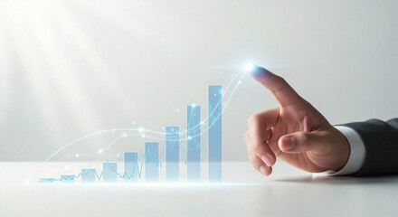 Hand of businessman pointing to glowing blue bar chart representing corporate growth and future success