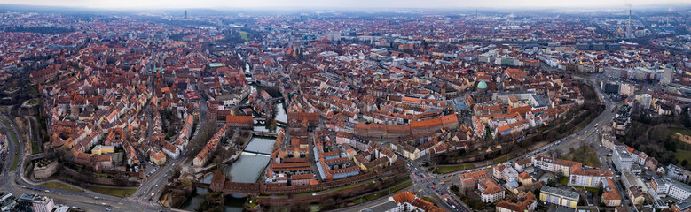 Obraz premium Aerial view around the old town of Nuremberg in Germany on a cloudy autumn day