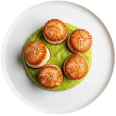Seared Scallops On Pea Puree Presentation On White Plate with Overhead View