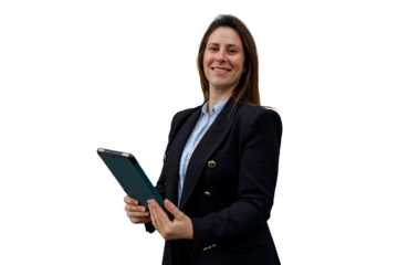 Professional businesswoman in black blazer holding a tablet, smiling and looking at camera with transparent background