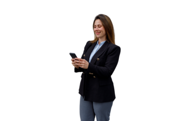Smiling businesswoman interacting with smartphone, texting and communicating, standing in business casual attire