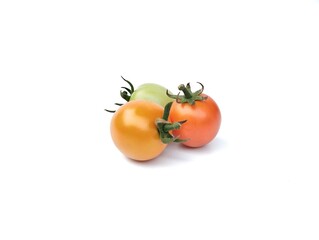 Fresh ripe and unripe tomatoes isolated on white background