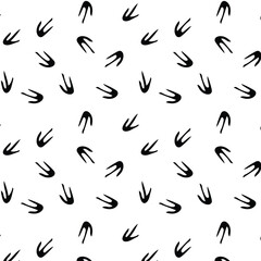 Seamless pattern with black penguin footprint on transparent background