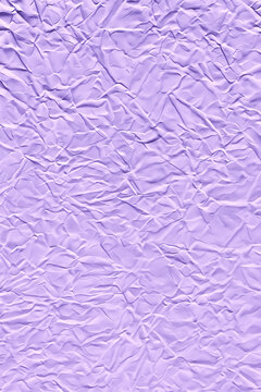 Lavender crumpled paper texture background with soft lilac folds and wrinkled creases for pastel wallpaper craft design mockup packaging backdrop and abstract surface pattern for web banners