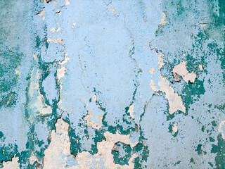 The house wall paint is peeling off