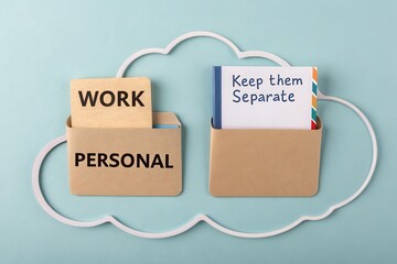 Paper folders labeled work and personal inside a cloud cutout