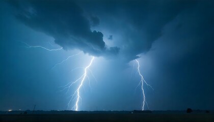 A dramatic lightning strike lights up a dark sky above a field, showcasing the intensity of storms and climate dynamics