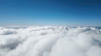Aerial Views of the Blue Sky, White Cumulus Clouds and Sunny Day Landscape