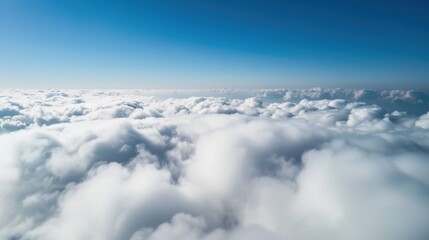 Aerial Views of the Blue Sky, White Cumulus Clouds and Sunny Day Landscape