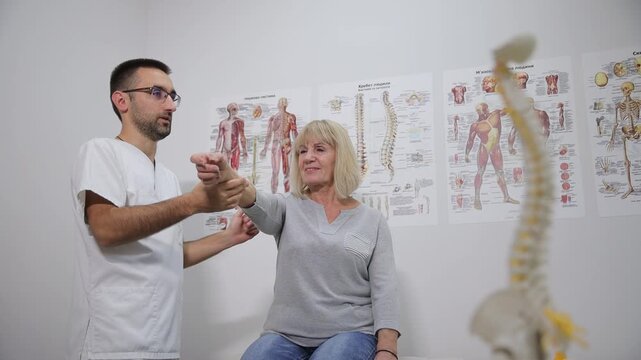 Medical professional assists patient during physiotherapy for effective recovery