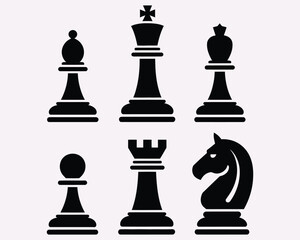 Chess Pieces in Strategic Silhouette: A set of classic chess pieces stands in strategic arrangement, each a distinct character in the ancient game, silhouetted with bold simplicity