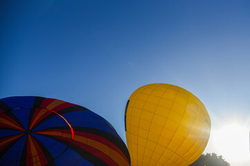 Obraz premium Balloons taking off into the blue sky