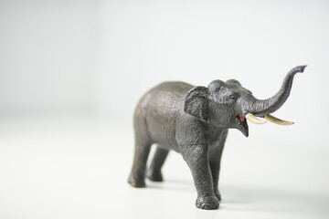 Obraz premium Close-up studio shot of an elephant figurine showcasing its intricate details